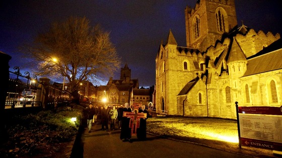 Church of Ireland Archbishop Michael Jackson and Catholic Archbishop Diarmuid Martin jointly carry a cross