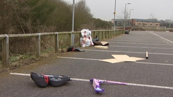 Items left in the car park to the sports pavilion include toys and a car seat