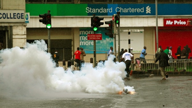 Riot police fire tear-gas to disperse supporters of Kenya's Prime Minister Raila Odinga