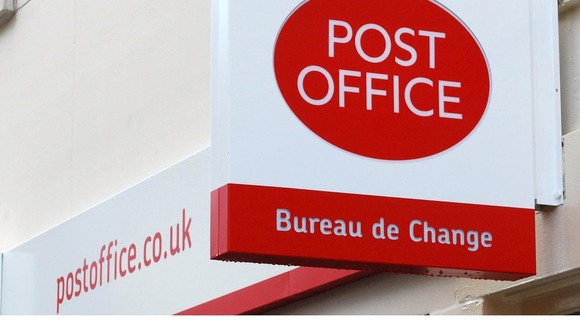 A Post Office sign.