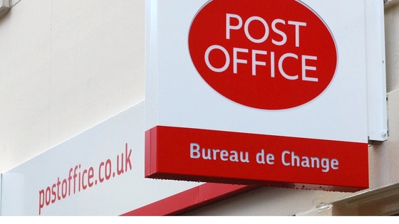 A Post Office sign.