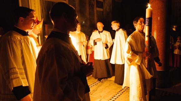 The Paschal candle is carried during the mass.