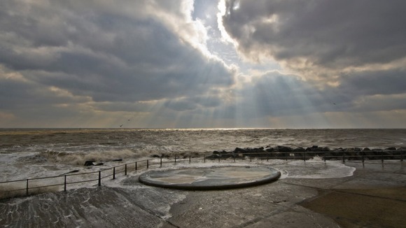 Waves crash ashore at Britain's most easterly point, Ness Point in Lowestoft, Suffolk on 26 March