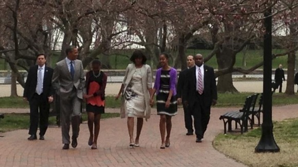 The Obama family walk to the Easter service at St John's Church