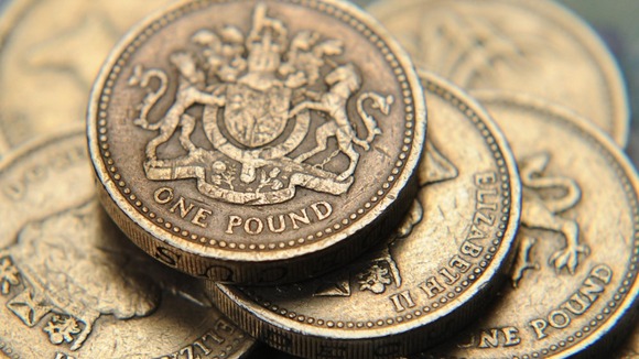A pile of one pound coins