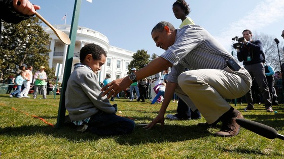 President Obama consoles Donovan Frazier, 5, who lost during his easter egg roll event on the South Lawn of the White House