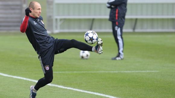 Bayern Munich winger Arjen Robben tries to boost his chances of a starting spot on the training pitch