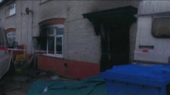 The charred front door of No. 18 Victory road in Allenton after the fire