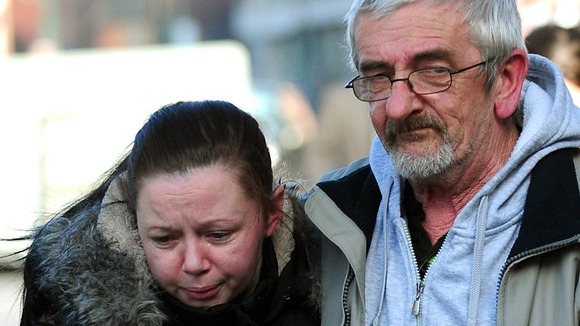 Jimmy Duffy, the father of Mairead Philpott, hugs daughter Bernadette, outside Nottingham Crown Court.