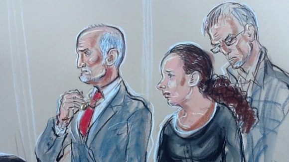 Mick Philpott kisses a cross around his neck. One for each of his six dead children as the verdicts are read out