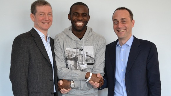 Fabrice Muamba shakes hands with the doctors that saved his life