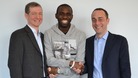 Fabrice Muamba shakes hands with the doctors that saved his life
