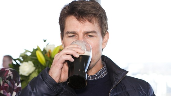 Tom Cruise enjoys a pint of Guinness