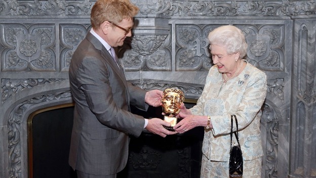 Most 'memorable Bond girl yet': The Queen receiving an honorary Bafta from Kenneth Branagh