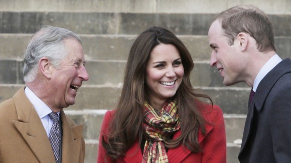 Kate wore a red Armani coat and yellow tartan scarf for her visit to Dumfries House