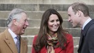 Kate wore a red Armani coat and yellow tartan scarf for her visit to Dumfries House