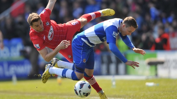 Reading's Chris Gunter (right) and Southampton's Jay Rodriguez