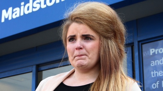 Youth Police and Crime Commissioner Paris Brown fights back tears as she speaks to the media