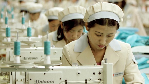 North Korean workers at a factory of South Korean shirt maker inside the Kaesong industrial park in 2005.
