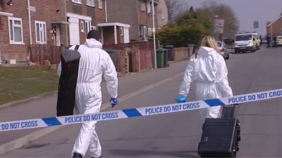 Forensic officers arriving