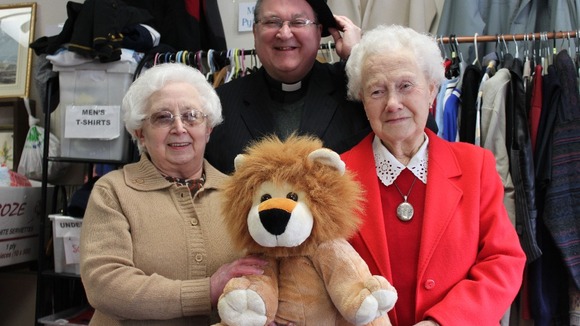 Volunteers at shop