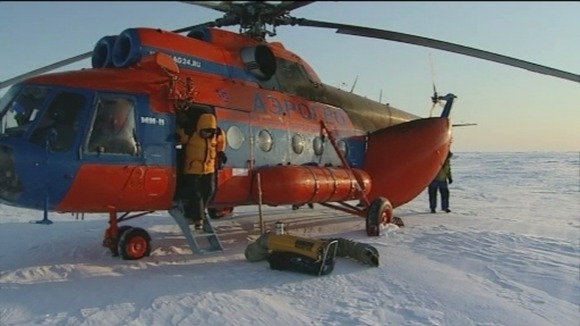 Stepping out of the helicopter near the North Pole