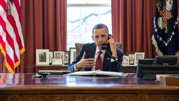 President Obama speaks to Nicole Hockley, the mother of the six-year-old Briton Dylan who died at Sandy Hook