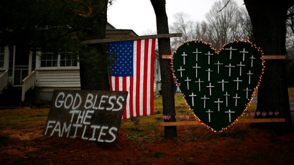 Tributes left to the victims of the shooting at Sandy Hook Elementary School in Newtown, Connecticut