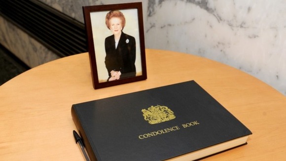 A condolence book along with Baroness Thatcher's portrait