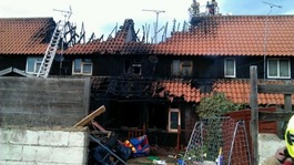 Fire-fighters tackle the fire.