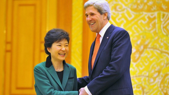 South Korean President Park Geun-Hye and US Secretary of State John Kerrry shake hands.