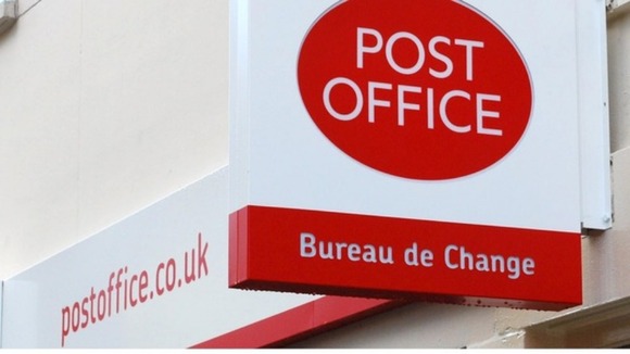 A Post Office sign.