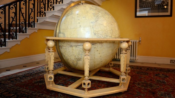 A finely-crafted wooden globe given as a gift to Lady Thatcher from French President Francois Mitterrand during a visit to Britain.