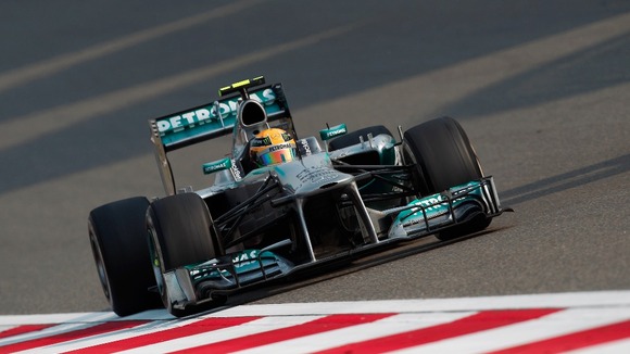 Hamilton takes pole