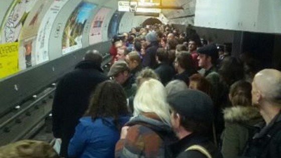 UK Uncut protesters on Northern Line platform at Kings Cross.