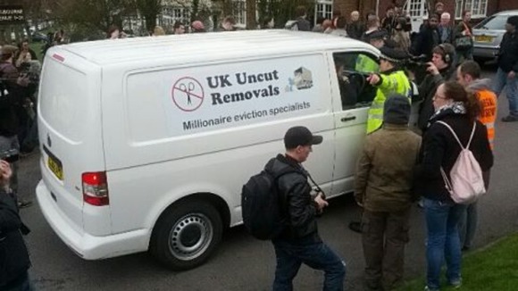 A UK Uncut removal van outside Lord Freuds home