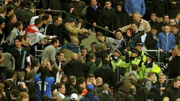 Millwall fans fought each other in the stands towards the end of the FA Cup match