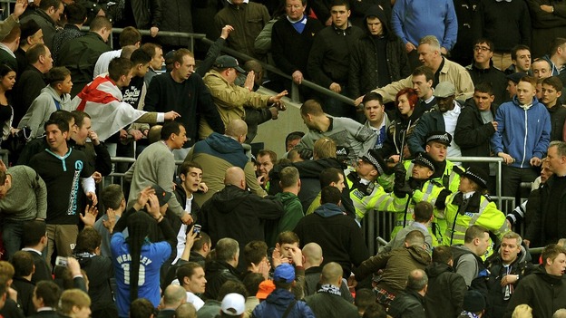 Millwall fans fought each other in the stands towards the end of the FA Cup match