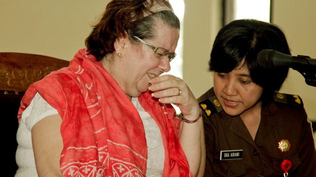Lindsay June Sandiford talks to an translator during her first trial in Denpasar Court, Denpasar, Bali.