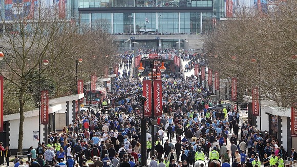 Fans make their way in to Wembley Stadium