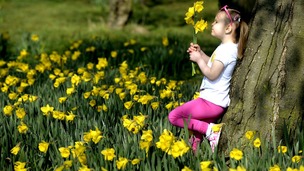 A girl enjoying the sunny weather in Shiremoor, North Tyneside