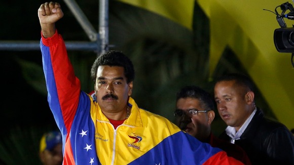 Nicolas Maduro celebrates after the official results gave him victory