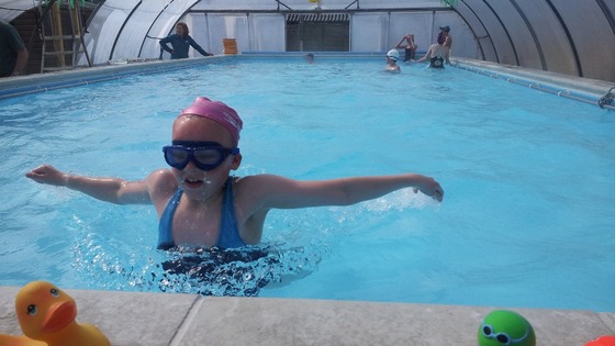 Children taking swimming lessons at Budleigh Salterton, Devon