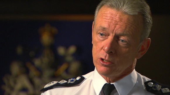 MCU middle aged man in police uniform