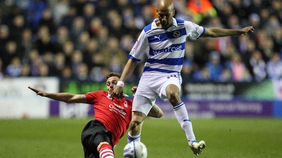 Reading's Jimmy Kebe (right) in action against Nottingham Forest's Paul Anderson