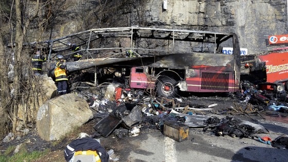 The debris of the coach on the road near the Alpe d'Huez. 