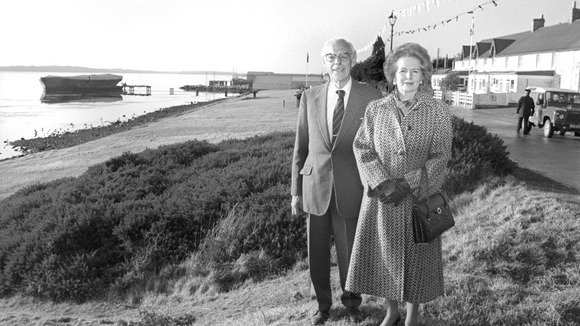 Margaret Thatcher and her husband Dennis standing on Victory Green in Port Stanley on the Falkland Islands.