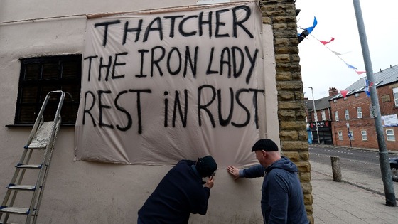 Residents from mining communities near Barnsley put out banners.