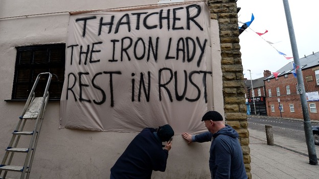 Residents from mining communities near Barnsley put out banners.