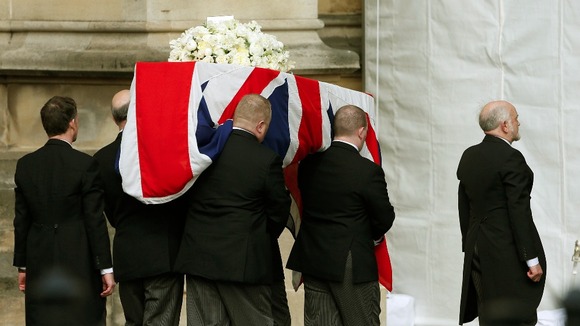 Pallbearers carry the coffin of former British prime minister Margaret Thatcher into the Palace of Westminster